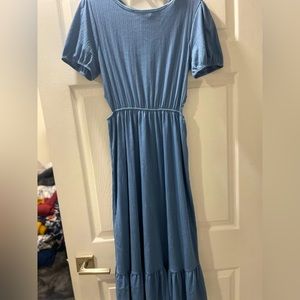 Large woman’s dress with cutout sides and cute tie at back